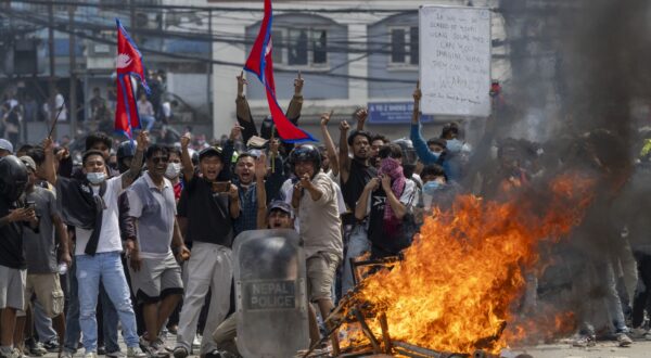 epa12362072 Protesters clash with police in front of the parliament building in Kathmandu, Nepal, 08 September 2025. Young demonstrators gathered in the capital to demand an end to corruption and the lifting of social media bans. The government shut down 26 platforms, including Facebook, YouTube, Instagram, and WhatsApp, after they refused to register in Nepal. At least six people were killed and dozens were injured during the protest.  EPA/NARENDRA SHRESTHA
