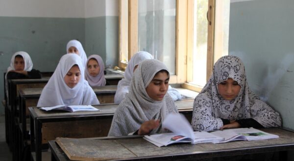 epa12362105 Afghan girls attend a class at the primary school after summer holidays in Kandahar, Afghanistan, 08 September 2025. As the new school year begins in Afghanistan following the summer holidays, the ongoing challenges regarding education for girls remain evident. Girls above the sixth grade cannot attend school, which has persisted for the past four years. This limitation affects many young women, impacting their access to education and opportunities for a brighter future.  EPA/QUDRATULLAH RAZWAN