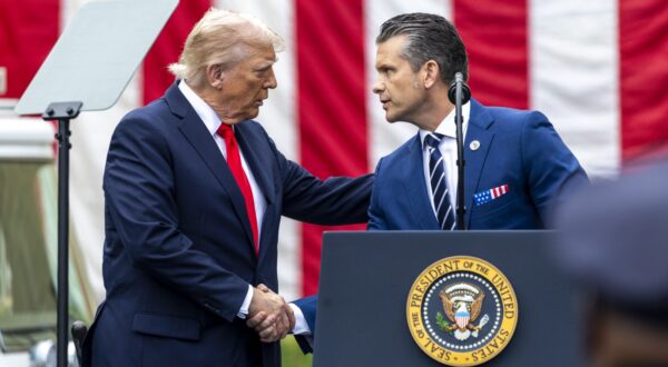 epa12369628 US Secretary of Defense Pete Hegseth (R) shakes hands with US President Donald J. Trump (L) during a ceremony to commemorate the 24th anniversary of the 9/11 terror attack at the Pentagon in Arlington, Virginia, USA, 11 September 2025. President Trump commented on the death of rightwing activist Charlie Kirk, saying the he will posthumously award him with the Presidential Medal of Freedom.  EPA/SHAWN THEW