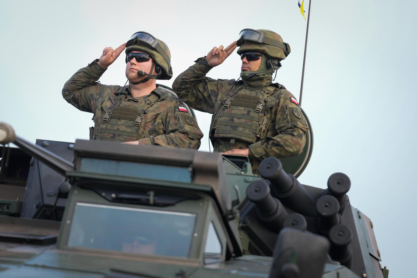 Military vehicles are seen in the early morning in Warsaw, Poland on 10 August, 2025. Rehearsals are taking place in Warsaw for the upcoming annual military parade. (Photo by Jaap Arriens / Sipa USA) Photo: Jaap Arriens/SIPA USA