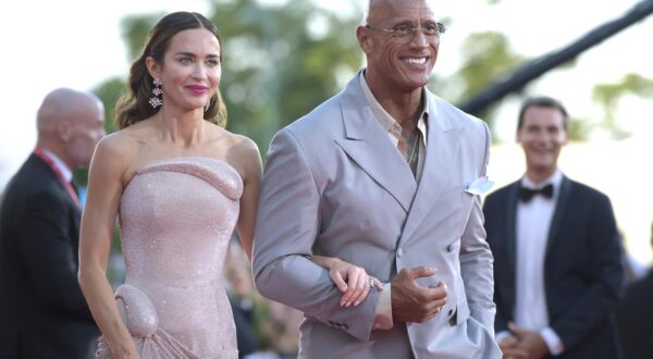 British-born American actress Emily Blunt and American actor and film producer Dwayne Johnson at the 82 Venice International Film Festival 2025. The Smashing Machine Red Carpet. Venice (Italy), September 1st, 2025 (Photo by Rocco Spaziani/Mondadori Portfolio/Sipa USA) Photo: Mondadori Portfolio/SIPA USA