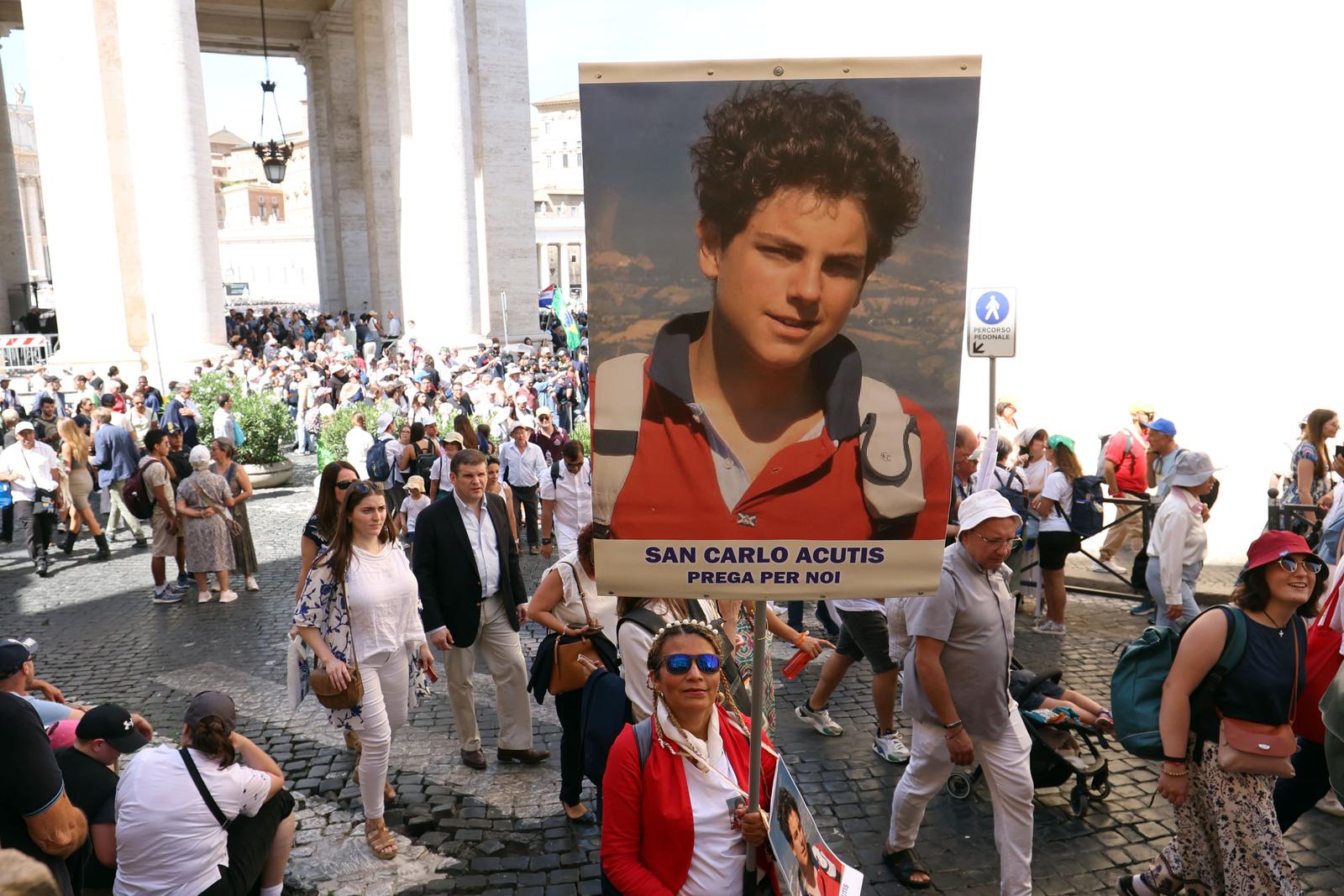 Vatican City, Italy, September 7, 2025: Faithful with the banner of Carlo Cutis in the streets of St. Peter's. Eucharistic celebration presided over by the Holy Father Pope Leo XIV, rite of canonization of the Blessed Laymen Pier Giorgio Frassati and Carlo Acutis in St. Peter's Square. (Photo by marco iacobucci / ipa-agency.net/IPA/Sipa USA) Photo: IPA/SIPA USA