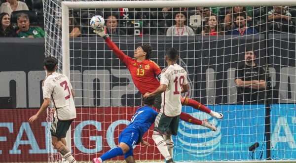 Sep 12, 2023; Atlanta, GA, USA; Uzbekistan forward Bobur Abdikholikov (17) scores on a header past Mexico goalkeeper Guillermo Ochoa (13) during the first half at Mercedes-Benz Stadium. Mandatory Credit: Dale Zanine-USA TODAY Sports/Sipa USA Photo: USA TODAY NETWORK/SIPA USA