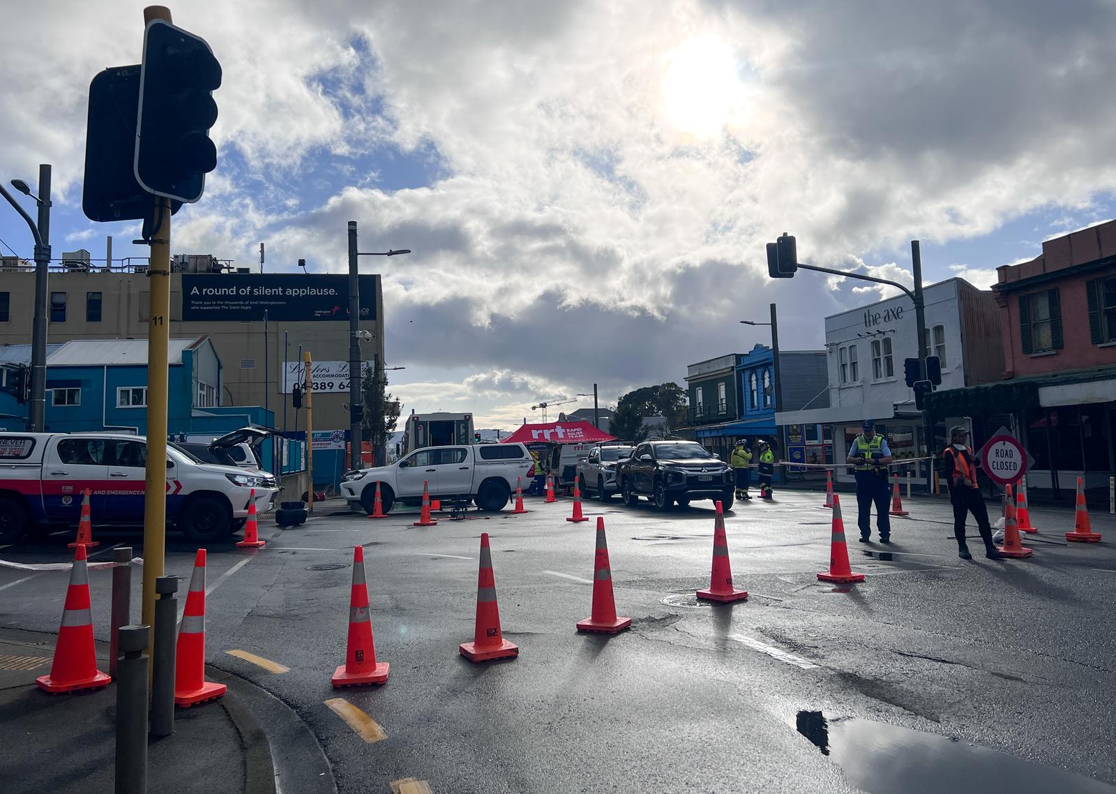 (230516) -- WELLINGTON, May 16, 2023 (Xinhua) -- Cordon lines are seen near the fire site of a hostel building in downtown Wellington, New Zealand, on May 16, 2023. Several people were killed and up to 30 others were believed unaccounted for after a blaze broke out overnight at a four-storey hostel building in downtown Wellington, police said on Tuesday. (Xinhua) Photo: Guo Lei/XINHUA