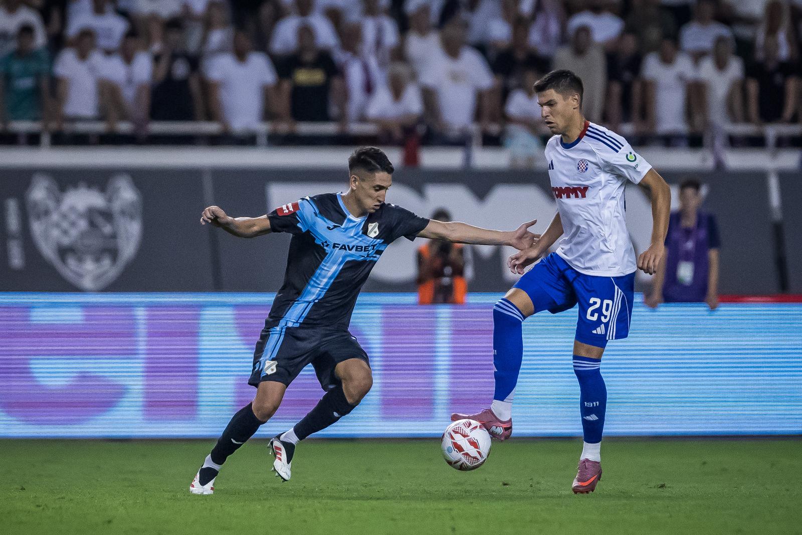 31.08.2025., Split - Utakmica Hajduk - Rijeka na splitskom Poljudu. Luka Menalo i Fran Karacic Photo: Zvonimir Barisin/PIXSELL