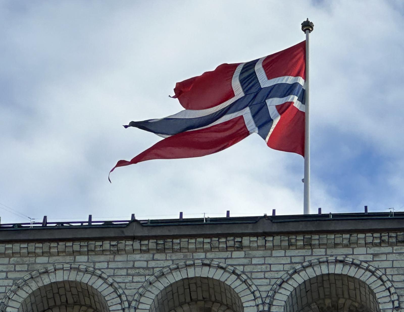 FILED - 11 October 2024, Norway, Oslo: The Norwegian flag flies over the country's parliament in Oslo Photo: Steffen Trumpf/dpa Photo: Steffen Trumpf/DPA