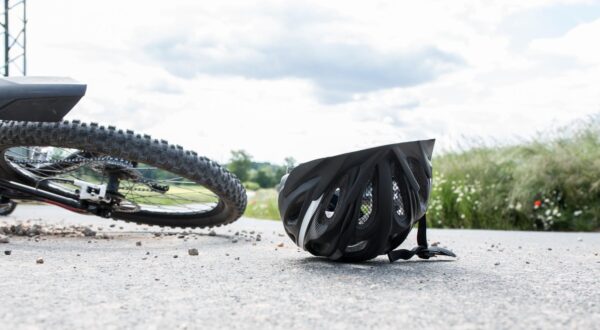 Bamberg, Germany May 26th, 2020: Symbolic images - 2020 bicycle lies on the ground next to it a helmet / cyclist fell / bicycle accident / accident with an injured cyclist / cyclist luckily wore a helmet / bicycle helmet / symbolic image of a bicycle accident with fall / bicycle fall / | usage worldwide /DPA/PIXSELL