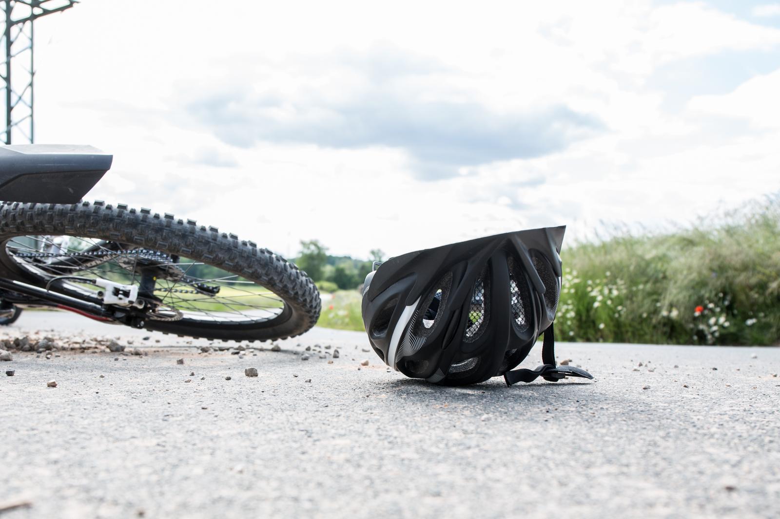 Bamberg, Germany May 26th, 2020: Symbolic images - 2020 bicycle lies on the ground next to it a helmet / cyclist fell / bicycle accident / accident with an injured cyclist / cyclist luckily wore a helmet / bicycle helmet / symbolic image of a bicycle accident with fall / bicycle fall / | usage worldwide /DPA/PIXSELL