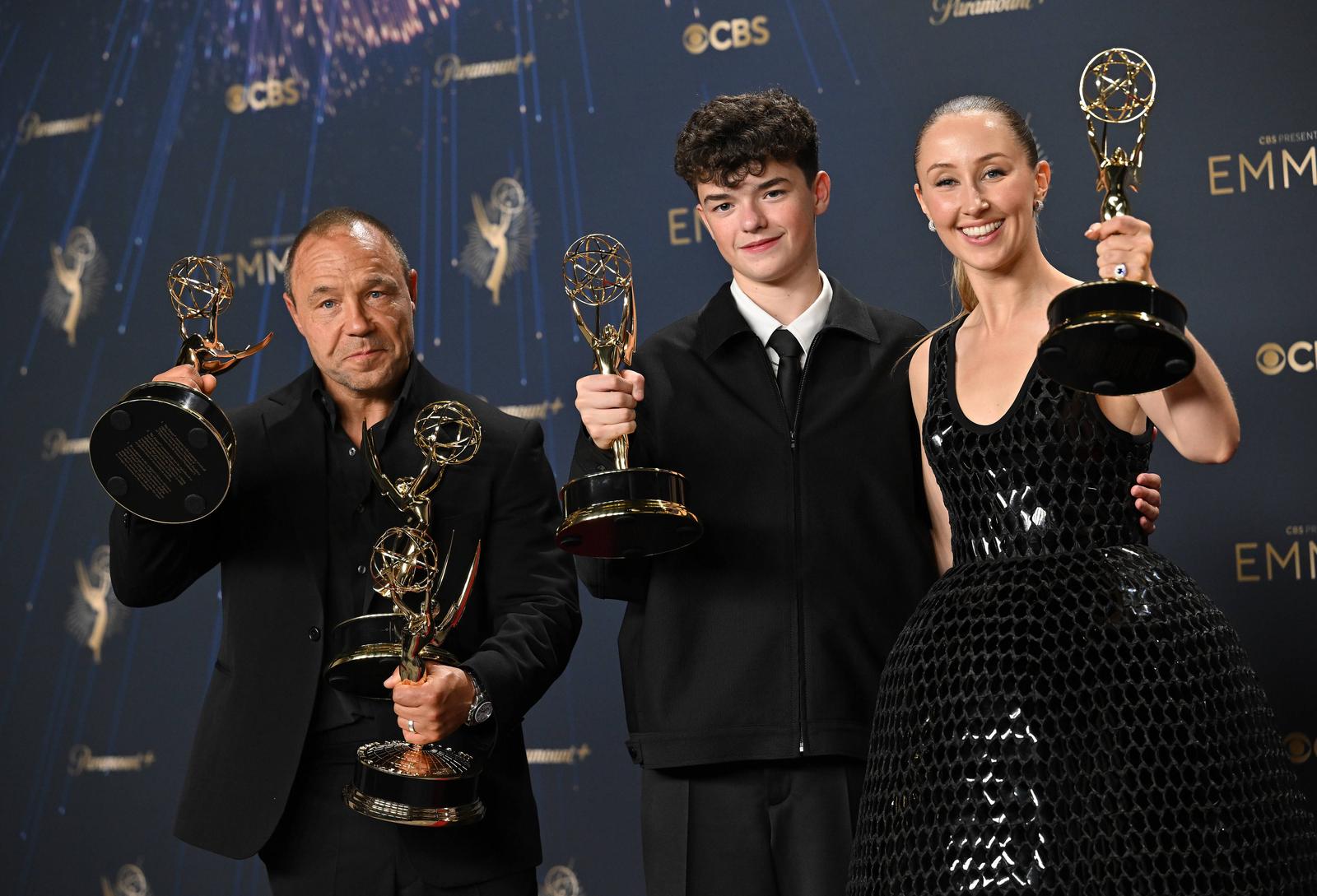 (L-R) Stephen Graha holds the Emmy for Outstanding Limited or Anthology Series, Outstanding Lead Actor in a Limited or Anthology Series or Movie, Outstanding Writing for a Limited Series or Anthology Series or Movie for 'Adolescence', Owen Cooper holds the Emmy for Outstanding Supporting Actor in a Limited or Anthology Series or Movie for 'Adolescence,' and Erin Doherty holds the Emmy for Outstanding Supporting Actress in a Limited or Anthology Series or Movie award for 'Adolescence,' backstage during the 77th annual Primetime Emmy Awards at the Peacock Theater in Los Angeles on Sunday, September 14, 2025. Photo by Chris Chew/UPI.. Photo via Newscom Photo: CHIS CHEW/NEWSCOM