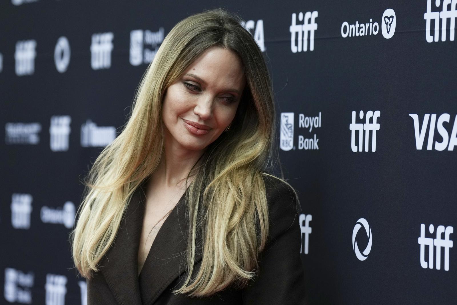 Angelina Jolie arrives on the red carpet to promote the film "Couture" at the Toronto International Film Festival, in Toronto, Sunday, Sept. 7, 2025. THE CANADIAN PRESS/Chris Young Photo: CHRIS YOUNG/PRESS ASSOCIATION