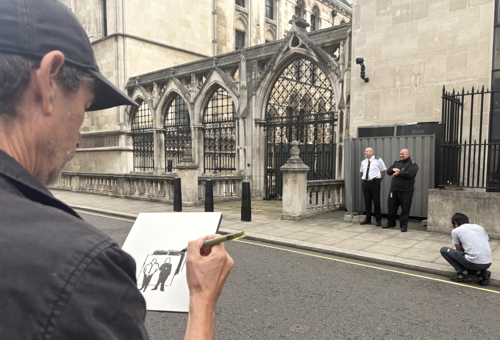 An artist draws the scene, where two security guards are standing next to the wall where a new artwork by artist Banksy has already been covered up at the Royal Courts of Justice in London. The artwork shows a judge attacking a protester with a gavel is on an external wall of the Queen's Building, part of the Royal Courts of Justice complex, and has been concealed by large sheets of black plastic and two metal barriers. Issue date: Monday September 8, 2025. Photo: Callum Parke/PRESS ASSOCIATION