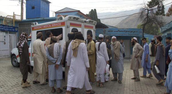 (250901) -- KABUL, Sept. 1, 2025 (Xinhua) -- People gather near an ambulance at a hospital in Kunar province, Afghanistan, Sept. 1, 2025. The death toll from the earthquake in eastern Afghanistan's Kunar and Nangarhar provinces has risen to 622, with 1,555 others injured, the country's Ministry of Interior Affairs said in a statement on Monday. (Photo by Qazafi/Xinhua) Photo: Qazafi/XINHUA