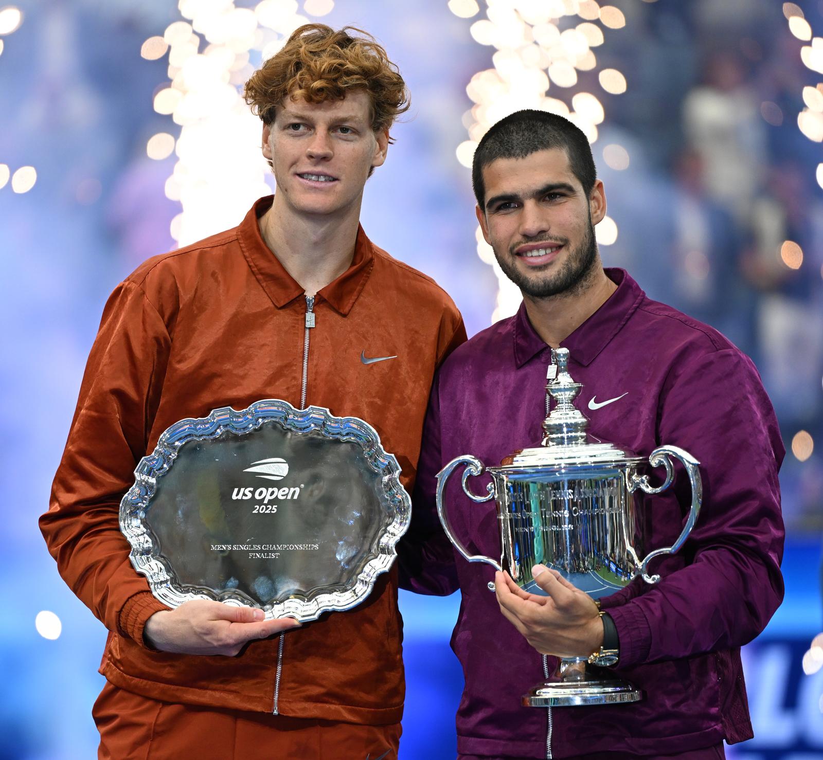 (250908) -- NEW YORK, Sept. 8, 2025 (Xinhua) -- Carlos Alcaraz (R) of Spain and Jannik Sinner of Italy pose with their trophies during the awarding ceremony after their men's singles final match at the 2025 US Open tennis championships in New York, the United States, Sept. 7, 2025. (Xinhua/Li Rui) Photo: Li Rui/XINHUA