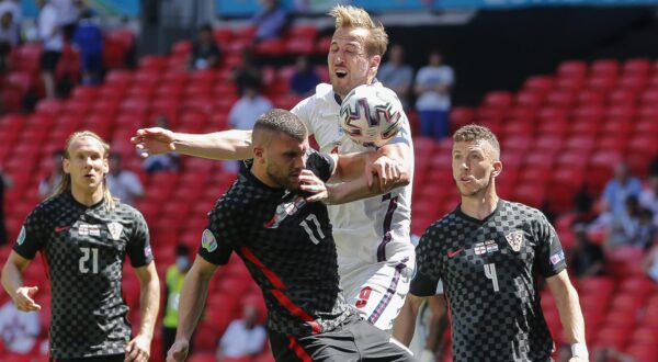 (SP)BRITAIN-LONDON-FOOTBALL-UEFA EURO 2020-GROUP D-ENG VS CRO (210614) -- LONDON, June 14, 2021 (Xinhua) -- England's Harry Kane (Top) jumps for a header during the Group D match between England and Croatia at the UEFA Euro 2020 Championship in London, Britain, on June 13, 2021. (Xinhua/Han Yan) Han Yan  Photo: XINHUA/PIXSELL