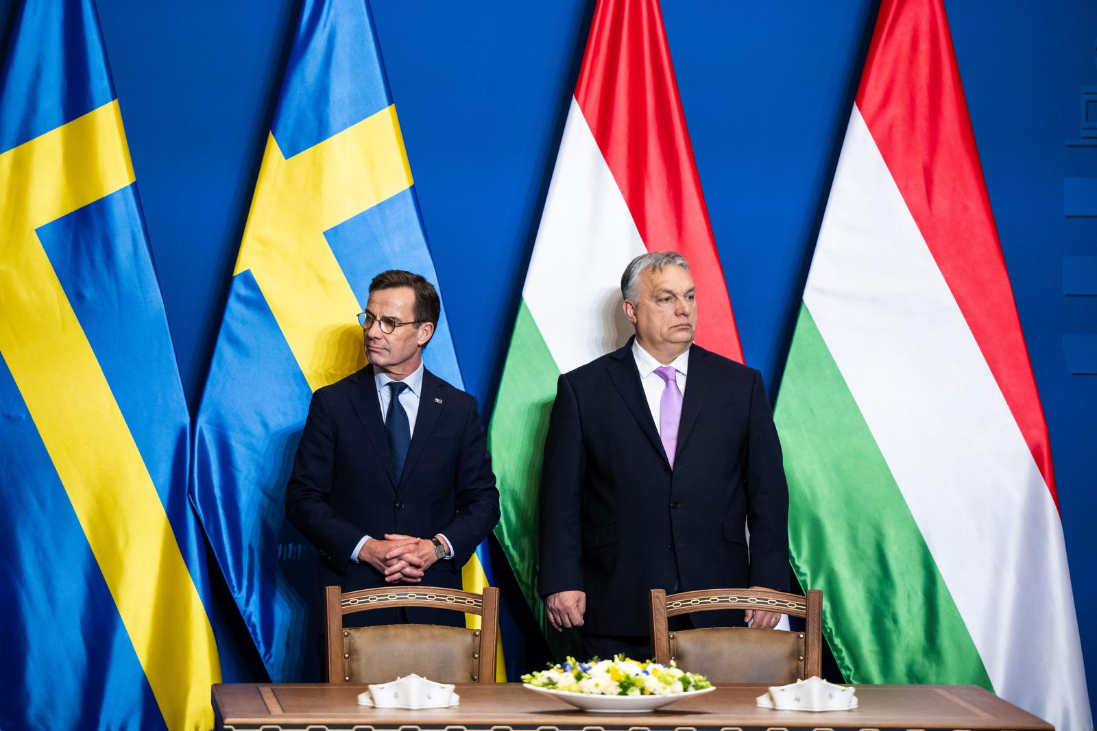 23 February 2024, Hungary, Budapest: Swedish Prime Minister Ulf Kristersson (l) and Hungarian Prime Minister Viktor Orban at a joint press conference in Budapest. Shortly before Hungary's expected approval of Sweden's accession to NATO, the two countries have agreed a comprehensive arms deal. Photo: Marton Monus/dpa Photo: MARTON MONUS/DPA