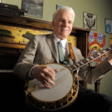 Actor, musician and writer Steve Martin practices with his banjo backstage before an appearance with the Steep Canyon Rangers band at Largo at the Coronet Theatre in Los Angeles, Friday, March 19, 2010. (AP Photo/Chris Pizzello)
