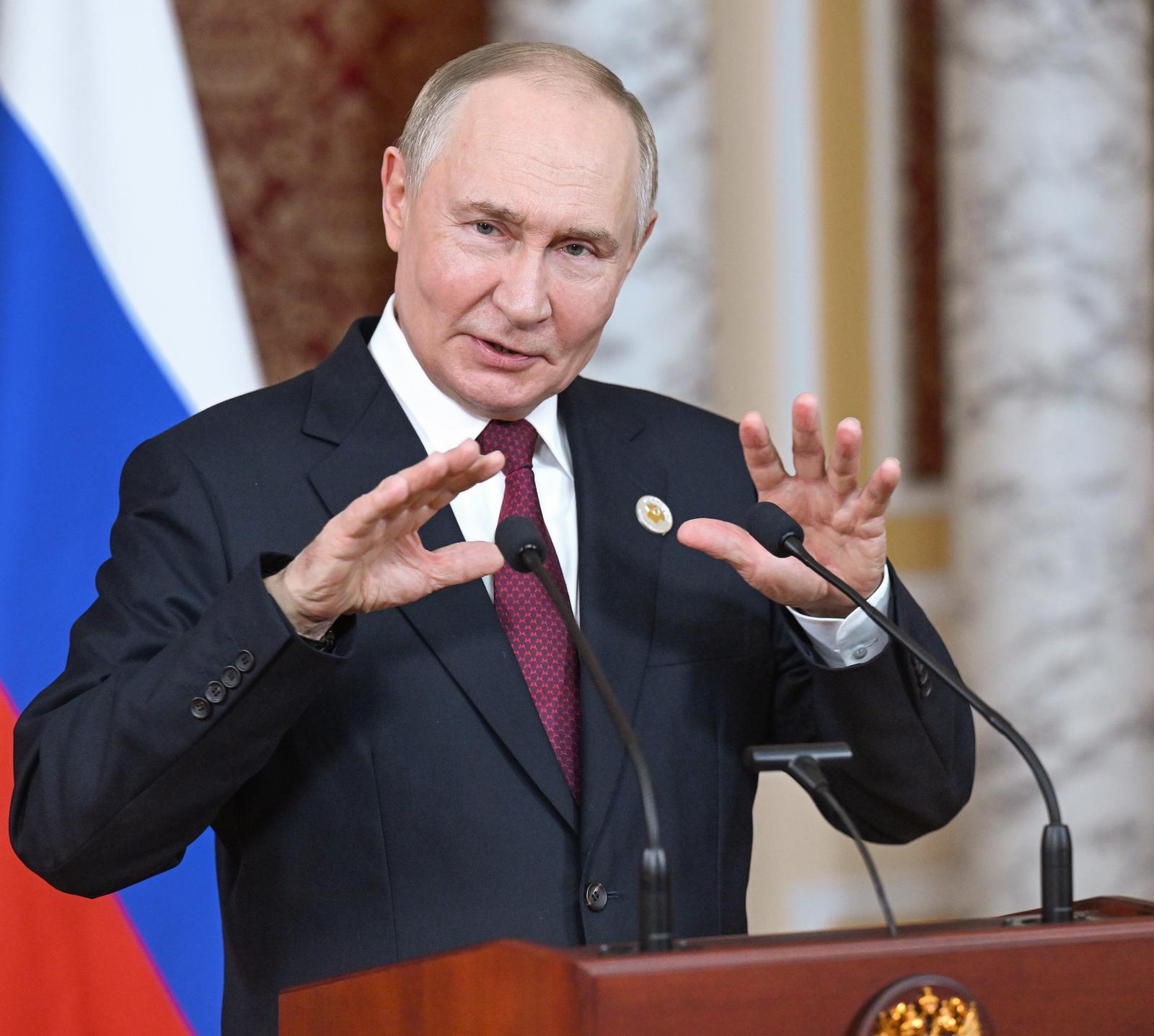 Russian President Vladimir Putin during a press conference following the meeting.
Credit: Dmitry Azarov/Kommersant Photo/Sipa USA Photo: Kommersant Photo Agency/SIPA USA