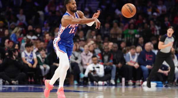 Apr 13, 2025; Philadelphia, Pennsylvania, USA; Philadelphia 76ers guard Jared Butler (12) passes the ball against the Chicago Bulls in the second quarter at Wells Fargo Center. Mandatory Credit: Kyle Ross-Imagn Images/Sipa USA Photo: Imagn Images/SIPA USA