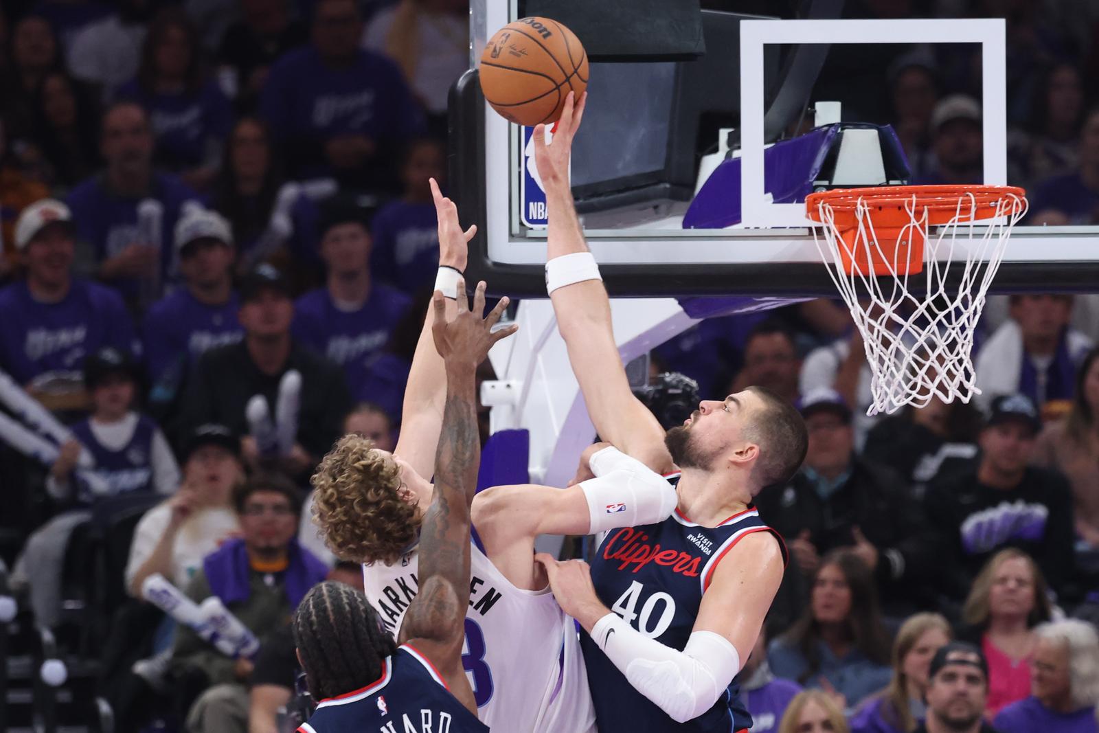 Oct 22, 2025; Salt Lake City, Utah, USA; Los Angeles Clippers center Ivica Zubac (40) blocks the shot of Utah Jazz forward Lauri Markkanen (23) during the second half at Delta Center. Mandatory Credit: Rob Gray-Imagn Images/Sipa USA Photo: Imagn Images/SIPA USA