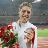 23.08.2008. Peking, Beijing - Najbolja hrvatska sportasica Blanka Vlasic osvojila je srebrnu medalju u skoku u vis na Olimpijskim igrama.Zlatno je osvojila Tija Hellebaut koja je visinu 205 centimetara preskocila iz prvog pokusaja, dok je Blanki to uspjelo iz drugog.Broncana je Ruskinja Ana Cicerova s preskocenih 203 cm.r