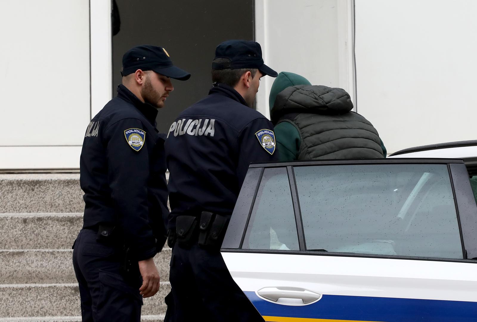 26.03.2024., Sibenik - Privodjenje jednog od osumnjicenih za napad ispred caffe bara "Delta" gdje je nasmrt pretucen 54-godisnjak. Photo: Dusko Jaramaz/PIXSELL