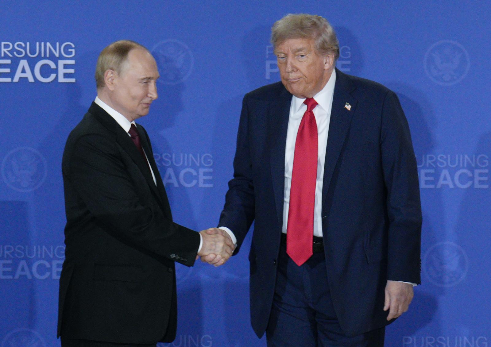 Russian President Vladimir Putin and President Donald Trump shake hands after a joint press conference at Joint Base Elmendorf-Richardson in Anchorage, Alaska, on Friday, August 15, 2025. Trump and Putin discussed a ceasefire deal to help end the two-year conflict between Russia and Ukraine. Photo by Bob Strong/UPI Photo via Newscom Photo: BOB STRONG/NEWSCOM