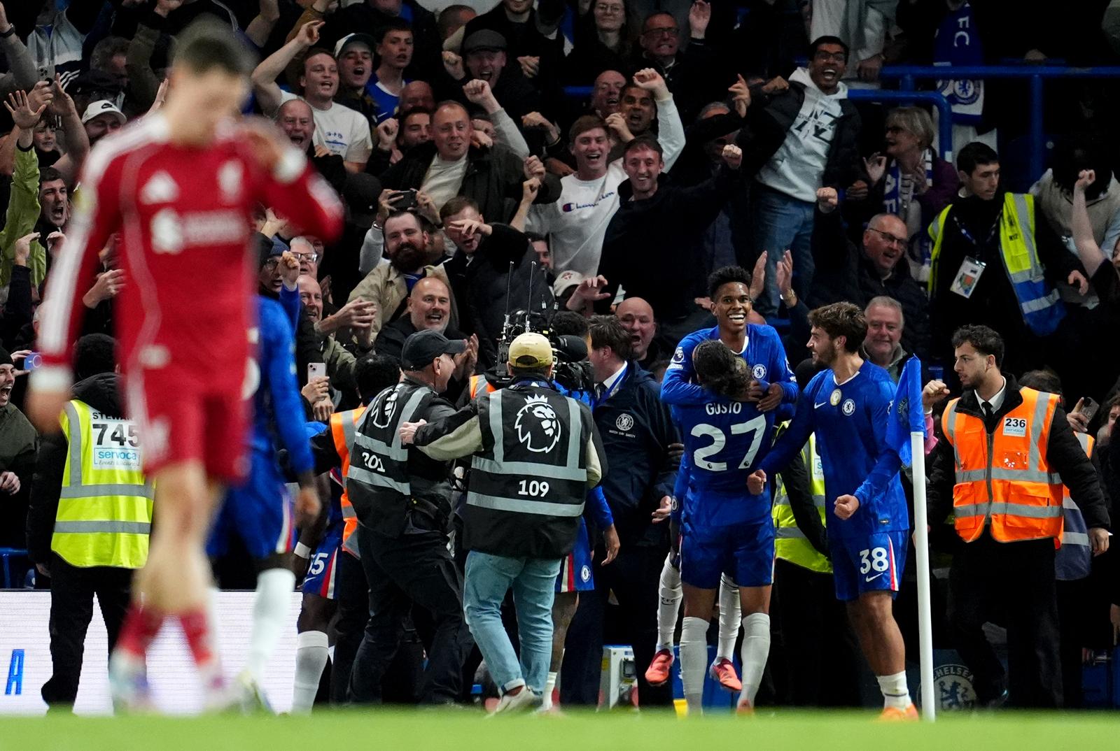 Chelsea's Estevao (top rear) celebrates after scoring his sides second goal during the Premier League match at Stamford Bridge, London. Picture date: Saturday October 4, 2025. Photo: Adam Davy/PRESS ASSOCIATION