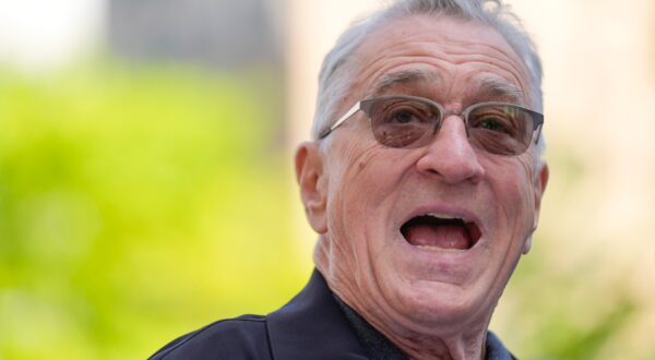 Robert De Niro speaks to reporters in support of President Joe Biden across the street from former President Donald Trump's criminal trial in New York, Tuesday, May 28, 2024. (AP Photo/Seth Wenig) Trump Hush Money